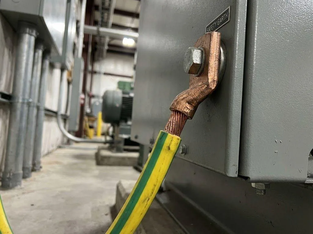 Checking proper grounding connections to prevent electrical interference that makes VFD Stops Randomly.